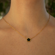 Black Flower on Yellow Gold Chain