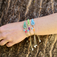 Intertwined Loop Bracelet with Evil Eye Charm