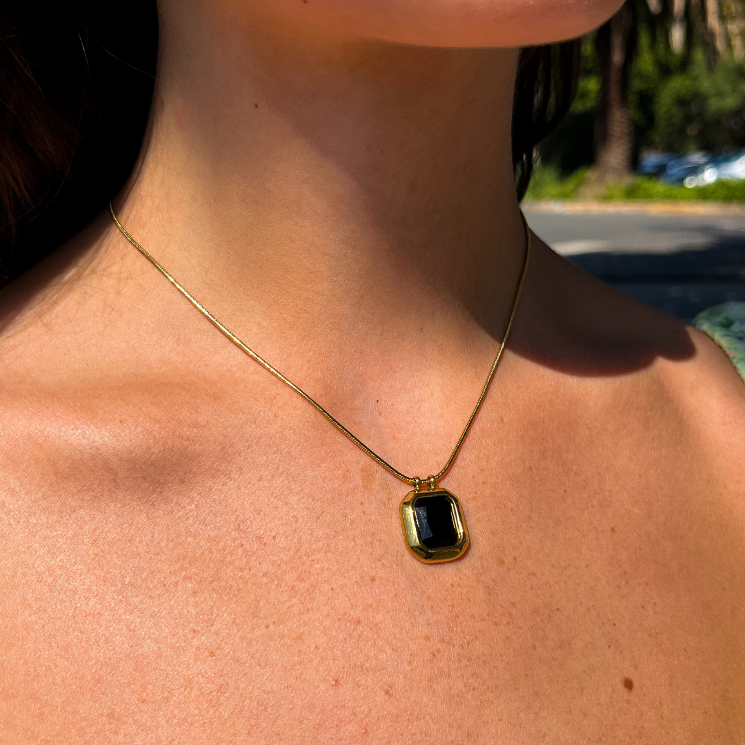 Black Faceted Stone on Yellow Gold Chain