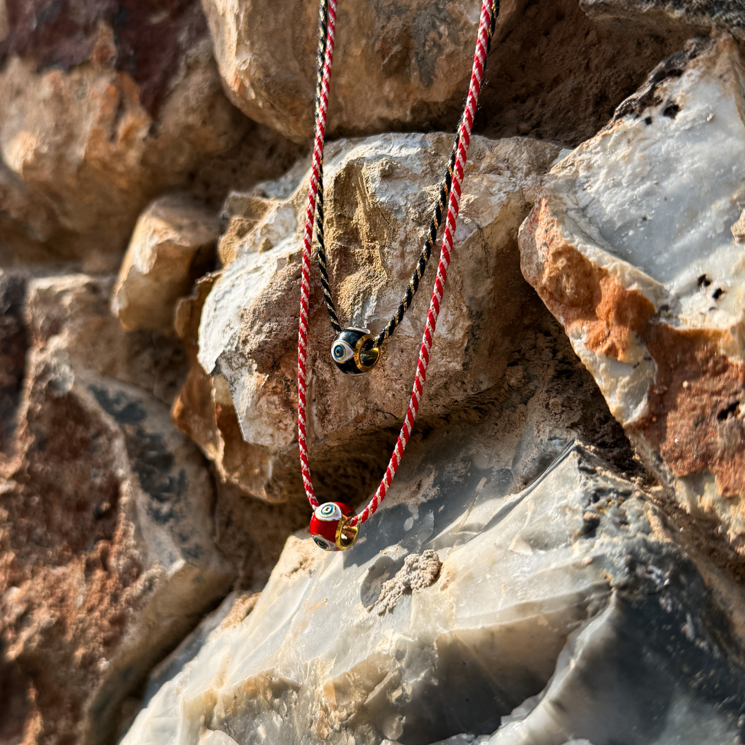 Evil Eye Barrels on Lucky Cord