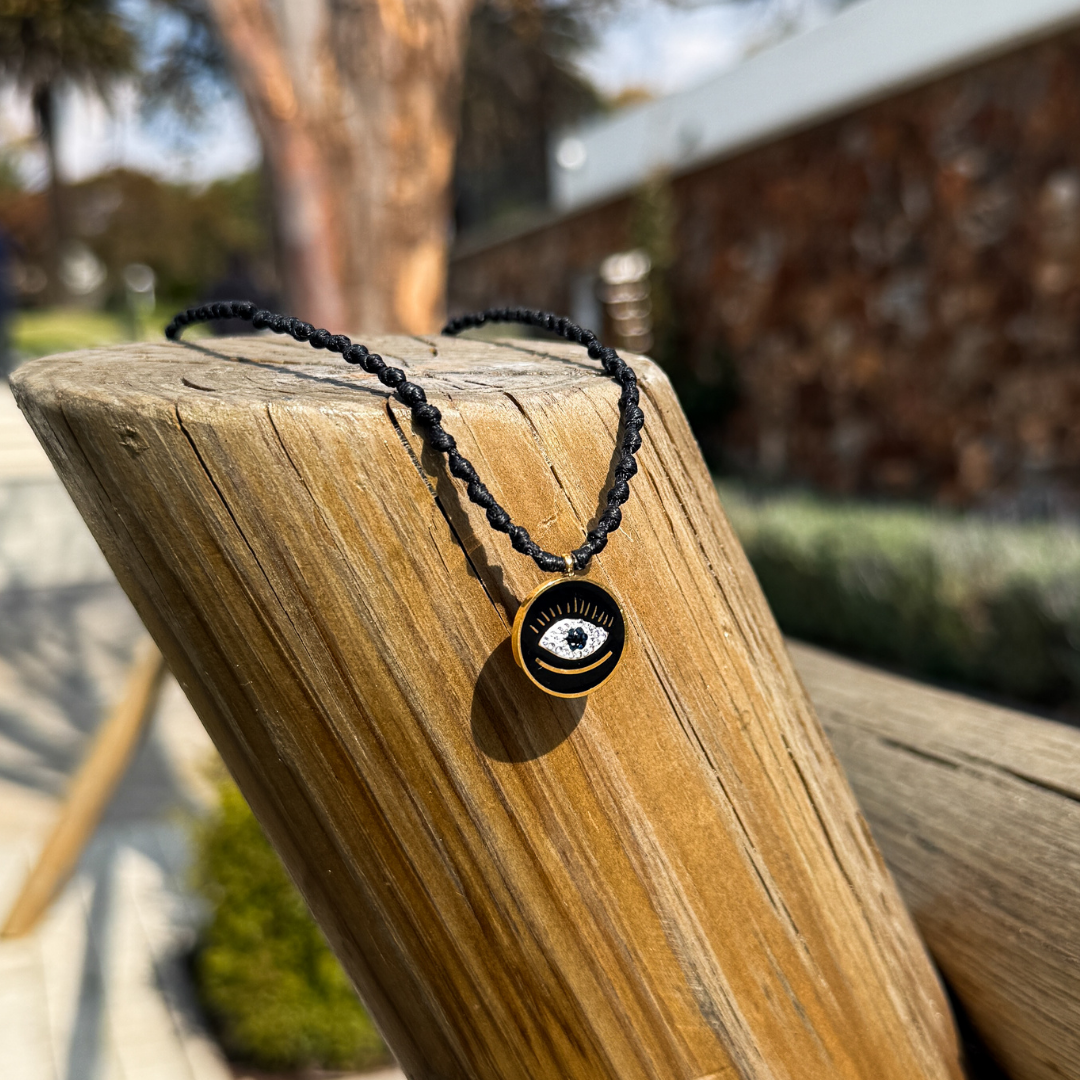 Evil Eye Pendant on Black Intermittent Cord
