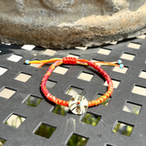 Pebbled Disk Bracelets
