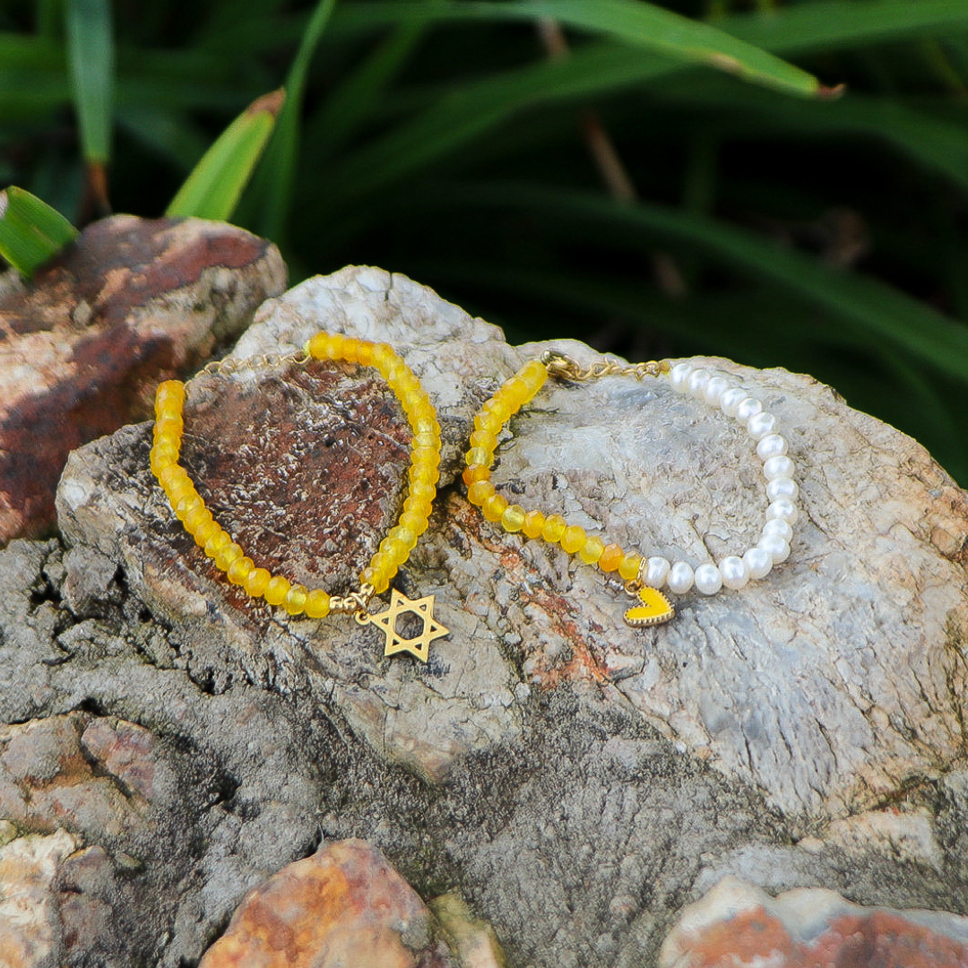 Charms on Yellow Crystal Beads