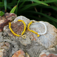 Charms on Yellow Crystal Beads