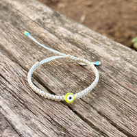 Yellow Evil Eye on Grey Box Knot Cord