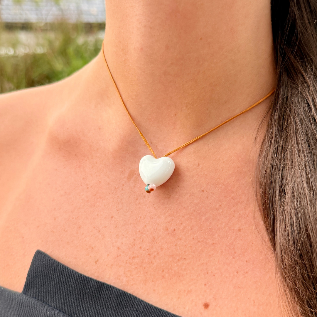 White Glass Heart on Plain Cord
