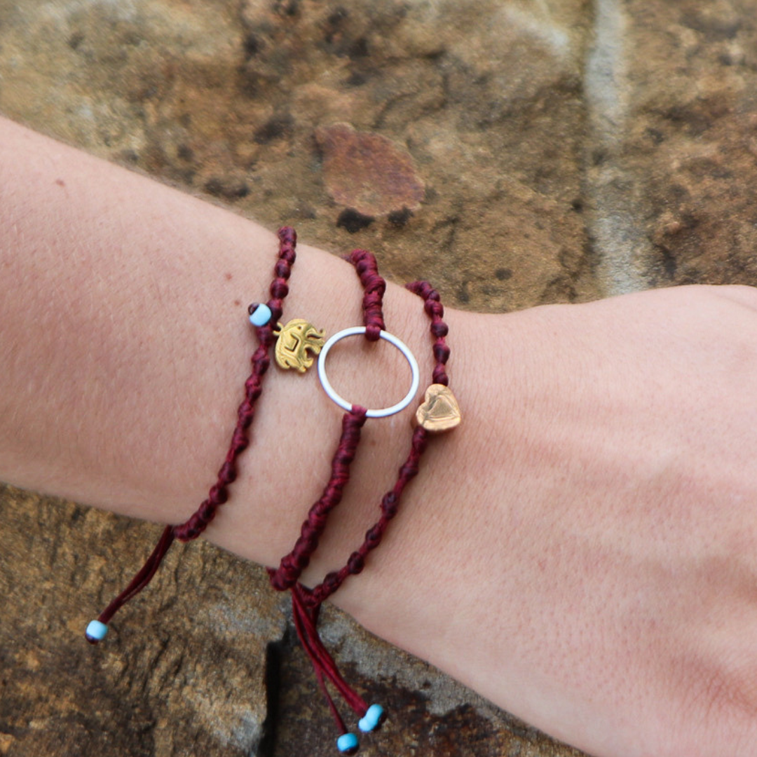 Charm on Maroon Cord