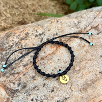 Yellow Gold Disc with Black Heart Spiral Cord