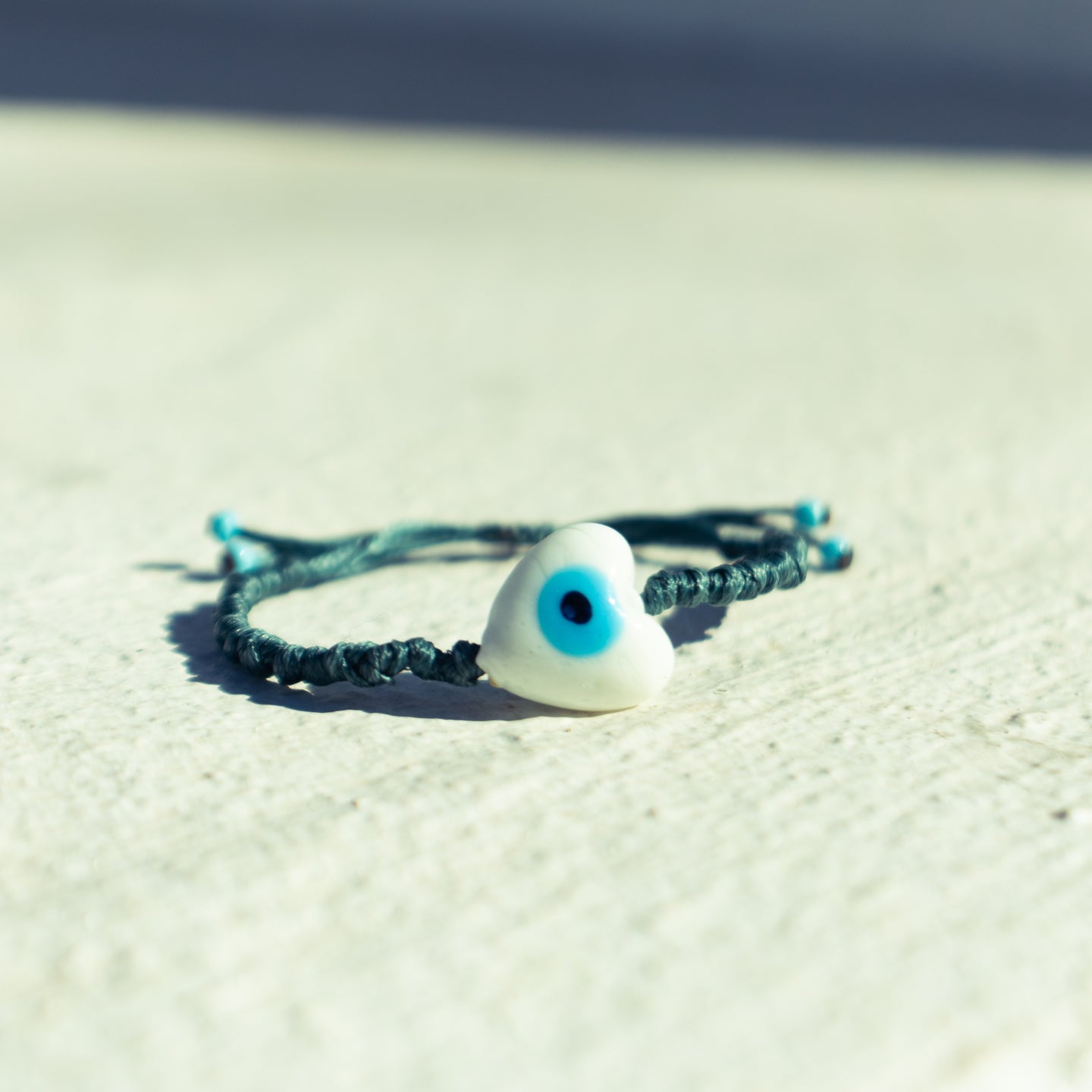 White Heart Evil Eye on Pebbled Cord