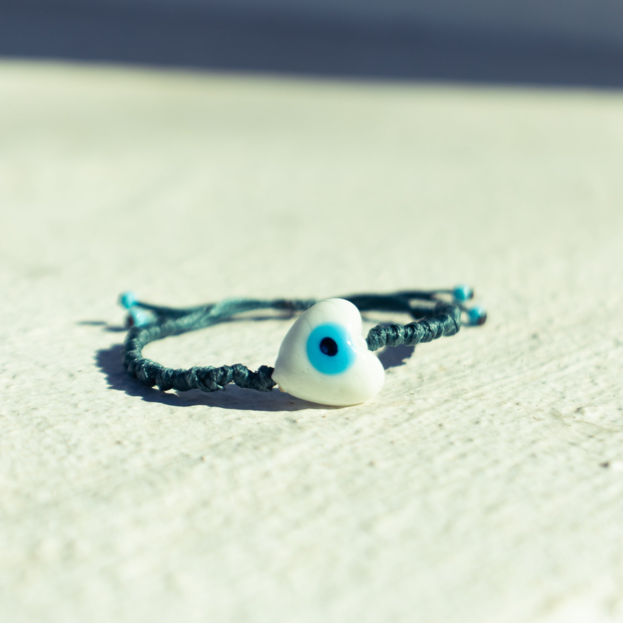 White Heart Evil Eye on Pebbled Cord